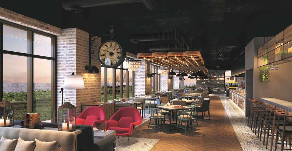 Hyatt Place Jaipur Malviya Nagar Restaurang bild The interior of the restaurant